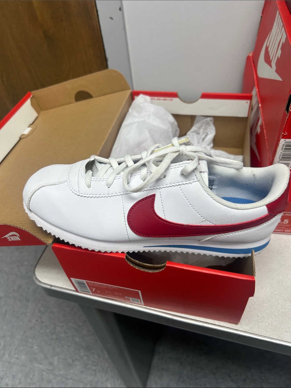 Nike Kids White Sneakers with Red Swoosh